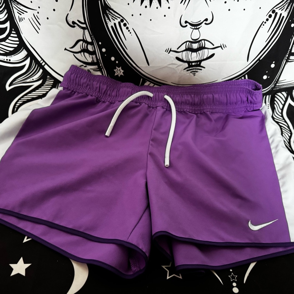 Nike Women's Purple Athletic Shorts with White Trim and Drawstring